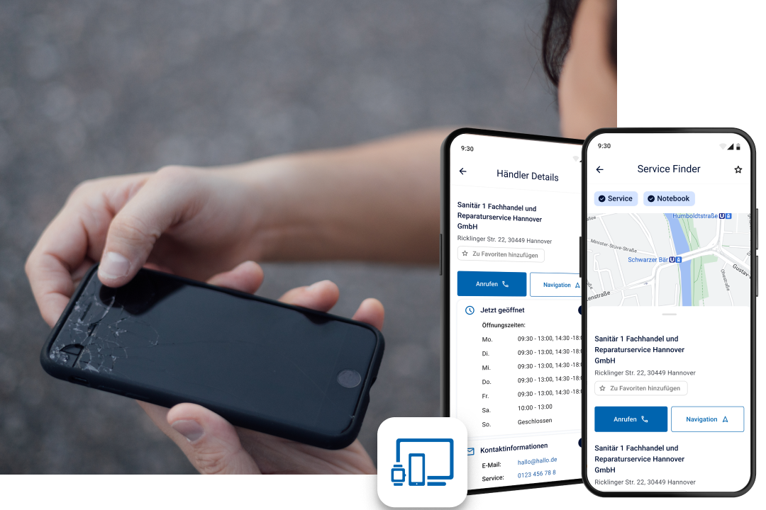 Eine Hand hält ein Smartphone mit kaputtem Display