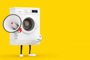 Waschmaschine mit Beinen und Megafon