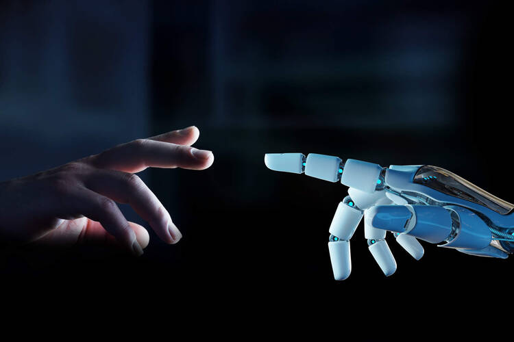Menschliche Hand berührt Roboterhand 
