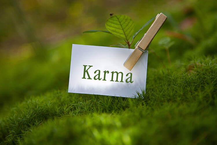 Schild mit Aufschrift "Karma"