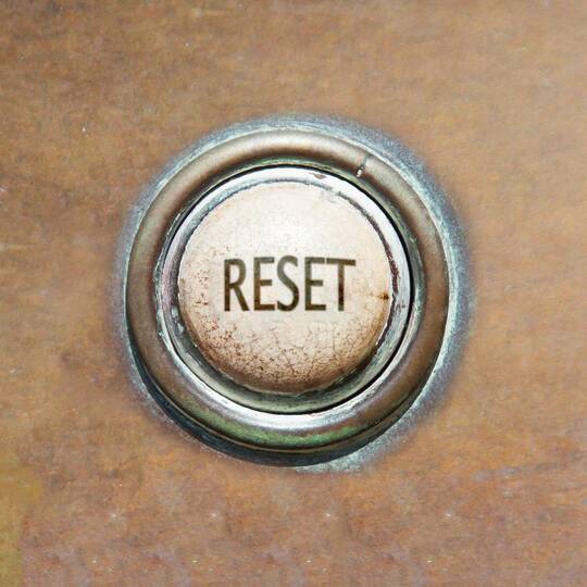 Ein Knopf mit der Aufschrift Reset